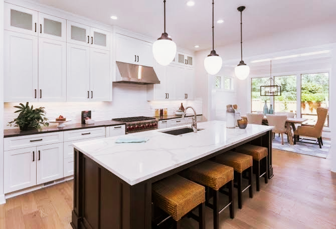 White quartz waterfall kitchen island